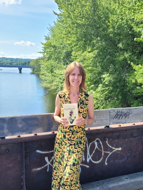 Lisa Alward on the bridge over the Nashwaak River in Fredericton, NB