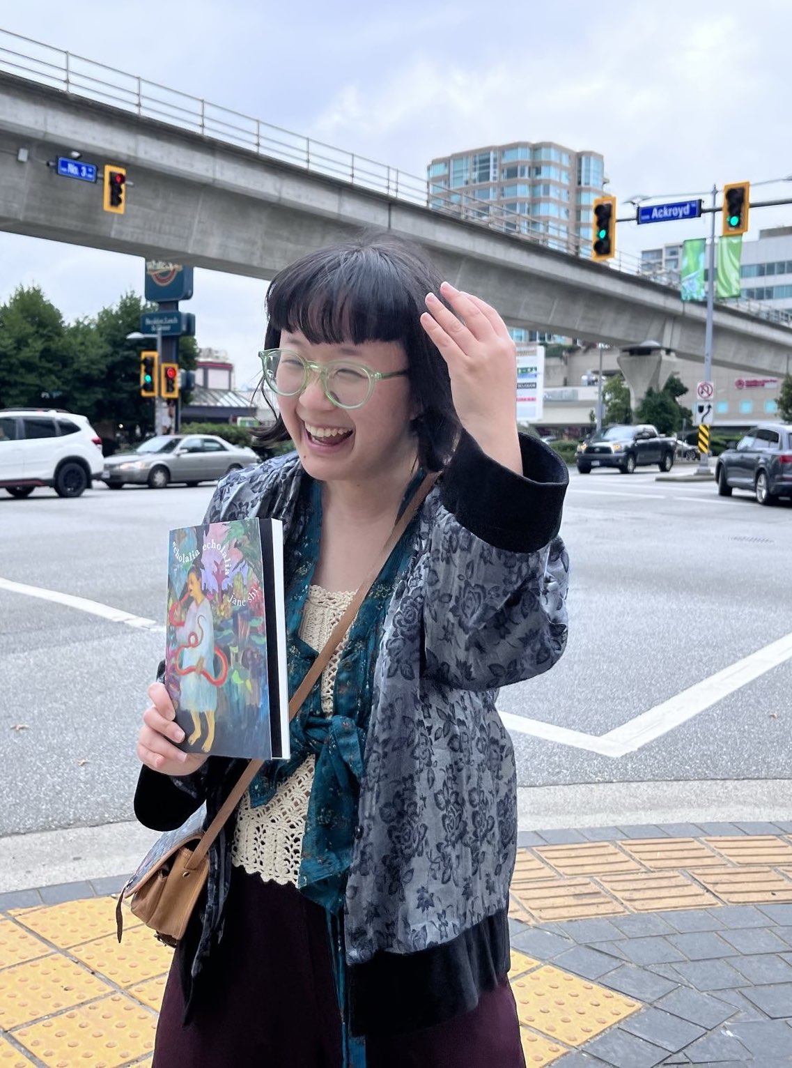 Author Jane Shi on the corner of No 3. road in Richmond BC.