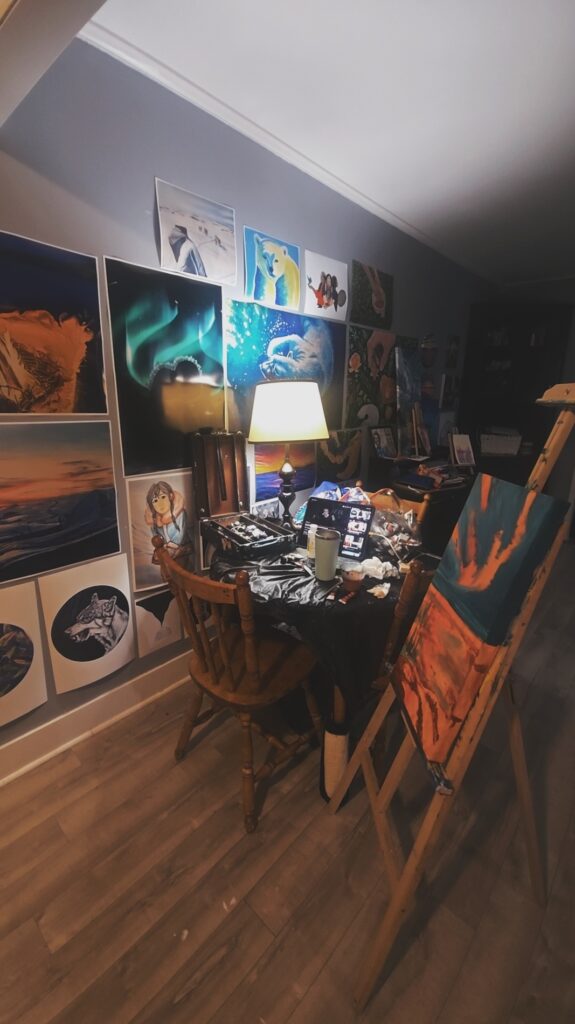Photo of Kayla Williams' painting and writing workspace. 